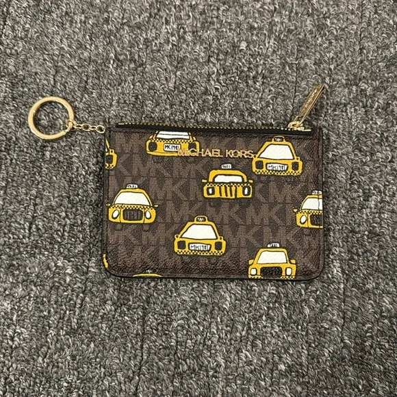 Michael Kors keychain wallet
BRAND NEW !
Cute taxi detail - Picture 4 of 4